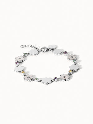 Silbernes Armband mit Blumenmotiven und funkelnden Steinen von PURELEI.