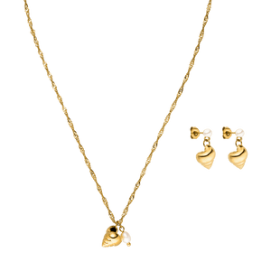 Goldene Kette mit Muschel-Anhänger und passenden Ohrringen von PURELEI, elegant und verspielt.