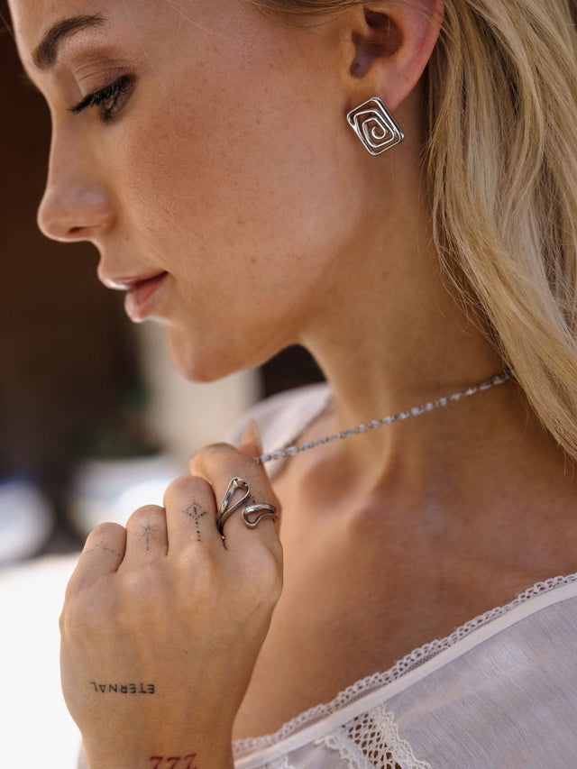 Motions Earrings - INT PURELEI
